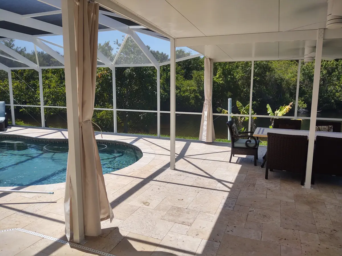 Cream curtains in outdoor living space
