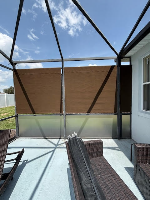 Sunbrella Hogan tan roller shades on patio