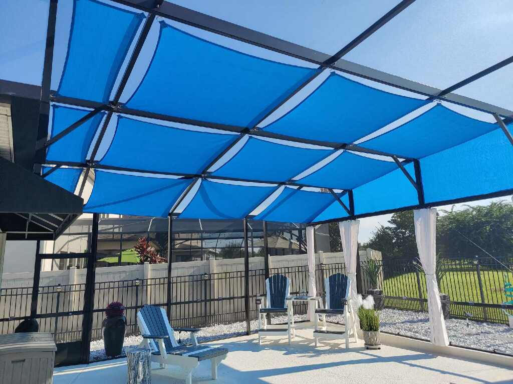 Grape colored shade sails in pool enclosure